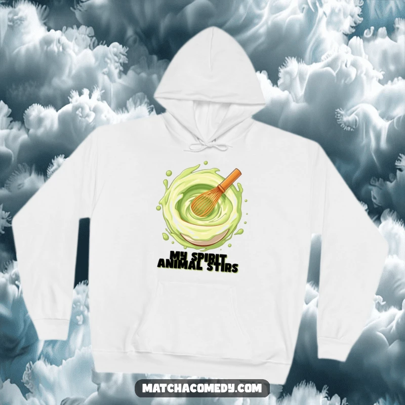 Funny matcha whisk creating a vibrant vortex of joy on a comfortable hoodie, perfect for playful warmth.