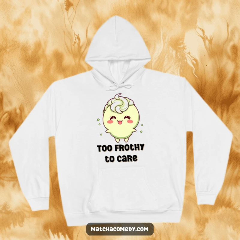Funny matcha tea cup character with a frothy swirl head, giggling with glee, offering warmth and whimsical humor on a comfy hoodie.