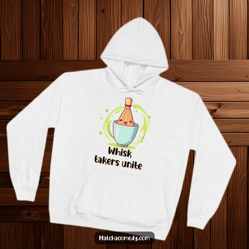 Funny matcha tea whisk spinning enthusiastically, depicted on a soft hoodie for ultimate comfort and cheer.