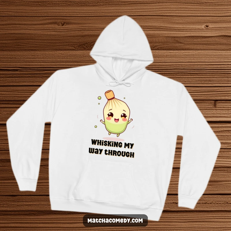 Funny Matcha Whisk Hoodie: A delightful character spinning merrily, offering warmth and a touch of humor in a cozy design.