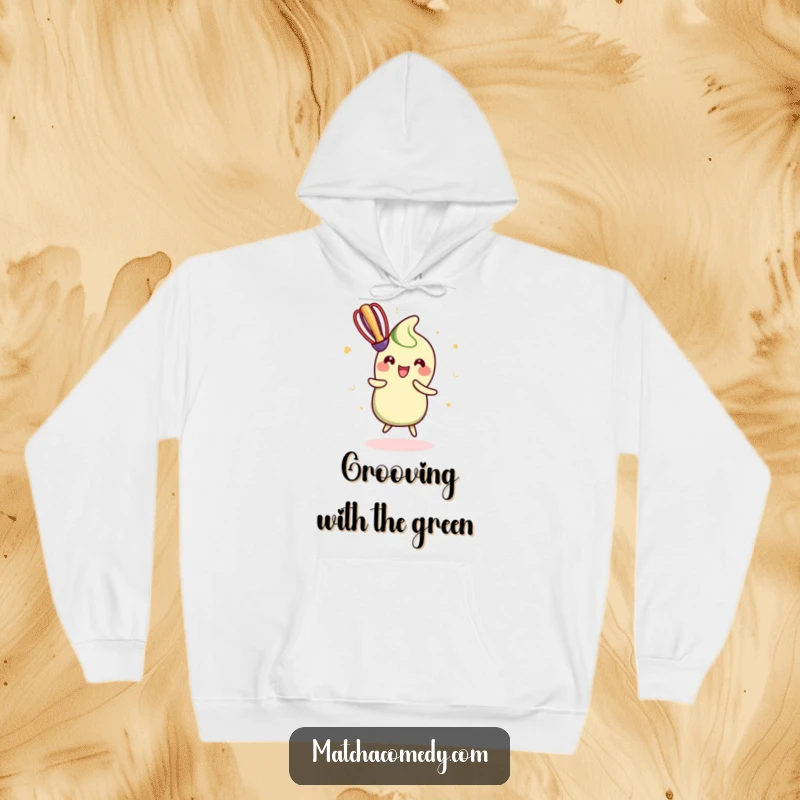 Funny Hoodie showcasing a kawaii matcha whisk in a joyful dance, designed for warmth and spreading happiness.