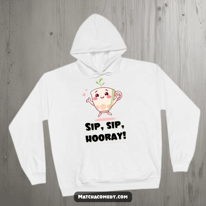 Funny matcha dancer hoodie featuring a cheerful tea cup character in a lively dance, exuding happiness and a love for matcha.