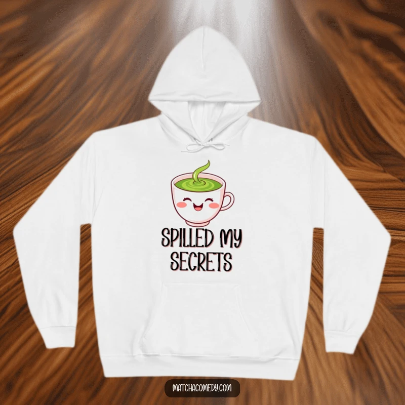 Funny laughing kawaii matcha tea cup with smiley face, spilling green liquid, hoodie.