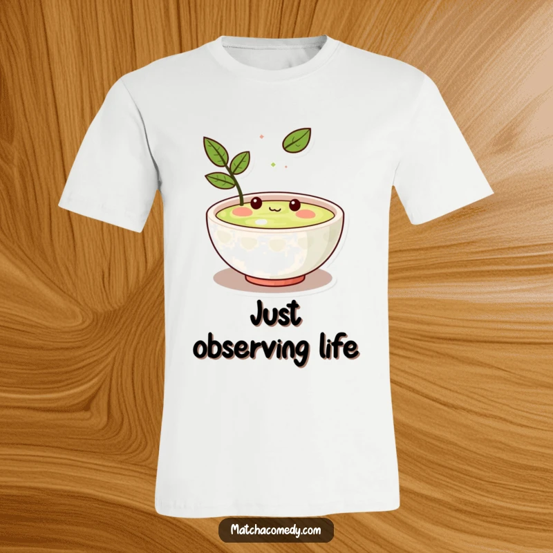 Funny Kawaii matcha bowl character humorously amused by a single floating leaf, soft fabric, designed for comfort and smiles.