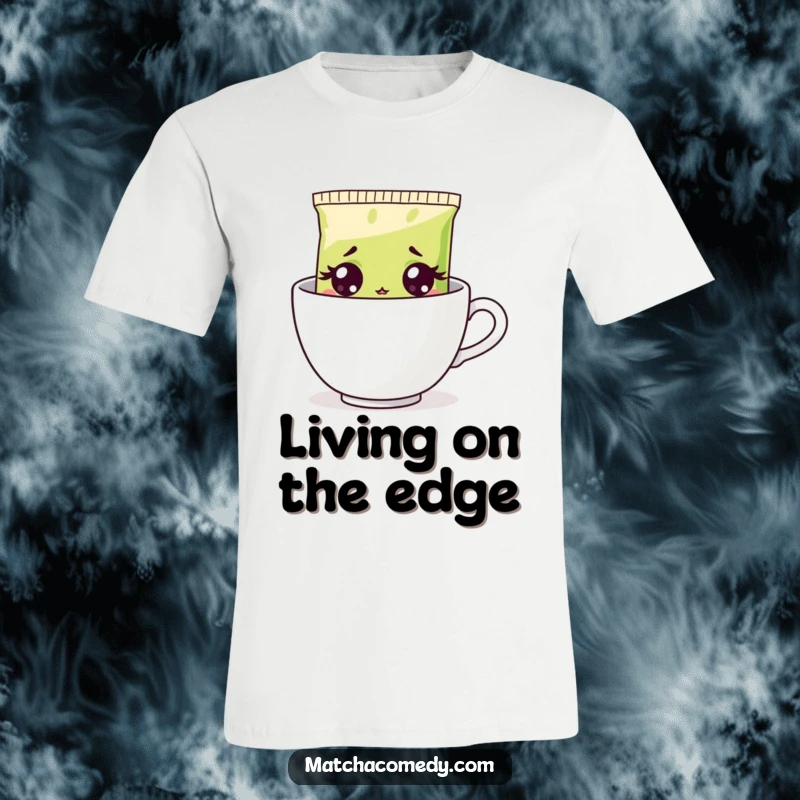 Funny surprised matcha tea bag design on a t-shirt, wide eyes peeking from a steaming cup, a humorous apparel item.